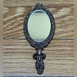 Vintage Ornate Hand Mirror in Antiqued Metallic Finish